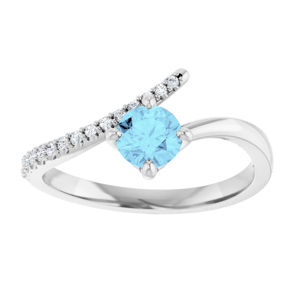 A round-cut aquamarine ring with a bypass design, featuring diamonds on the band, set in white gold.