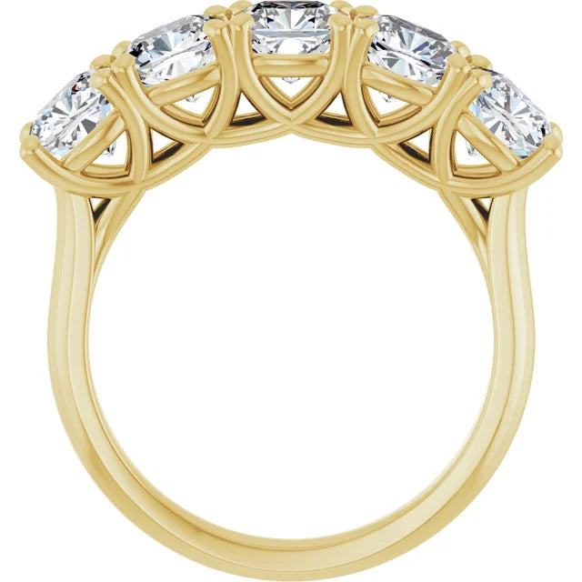 Cushion cut shared-prong anniversary band with cathedral gallery design in yellow gold, side profile cathedral u prong setting