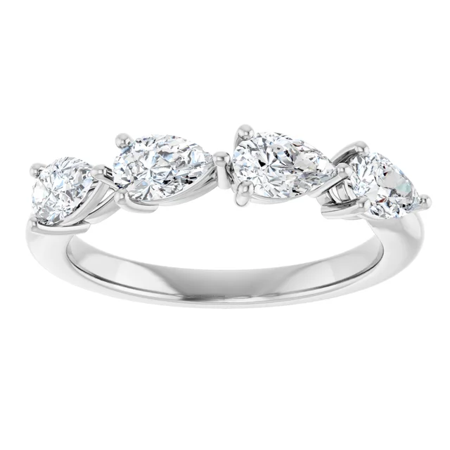 White gold ring with four pear cut lab-grown diamonds in elegant prong settings